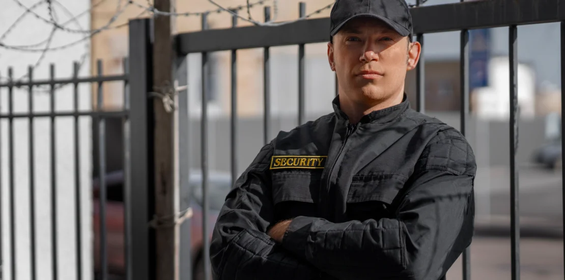 Security guard wearing professional attire supplied by experienced security clothing suppliers.